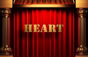 goldenes Wort des Herzens auf rotem Vorhang foto