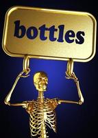 Flaschenwort und goldenes Skelett foto