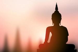 großer buddha silhouette sonnenuntergang hintergrund foto