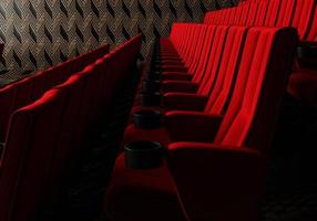reihen von roten samtsitzen, die filme im kino mit kopierraumbannerhintergrund ansehen. Unterhaltungs- und Theaterkonzept. 3D-Darstellungswiedergabe foto