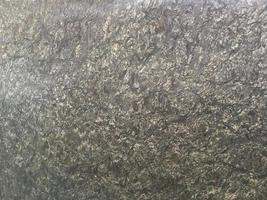 granit stein dunkelgrau stein freiform block ziegelboden raue oberfläche textur steinmaterial wand schmücken hintergrund foto
