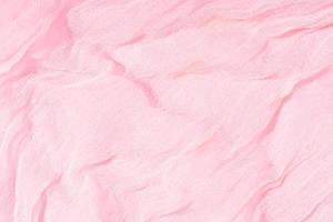 Rosa abstrakte Hintergrundtextur aus weichem Chiffon. Vollbild foto