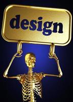 designwort und goldenes skelett foto
