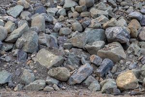 Hintergrund von großen Granitpfählen. foto