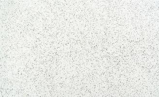 Schwarz-Weiß-Muster aus Terrazzoboden Textur Hintergrund. Terrazzo-Bodenbelag. nahtloses muster des terrazzobodens. Wand besteht aus Splittern aus Marmor, Quarz, Granit mit einem zementartigen Bindemittel. foto