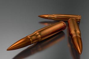 3D-Kugeln auf einer grauen reflektierenden Oberfläche. Goldpatronen in 3D-Darstellung foto