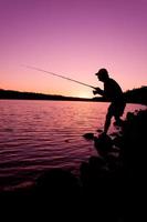 Fischer bei Sonnenuntergang foto