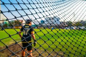 Fußballtornetz mit unscharfem Hintergrund foto