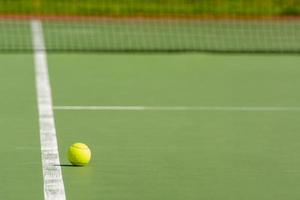 grüner Tennisball foto