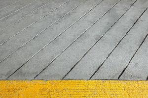 zementoberfläche strukturiert vom straßenhintergrund. foto