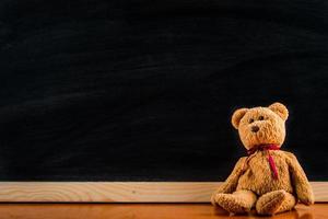 Teddybär mit Tafel, Hintergrund foto