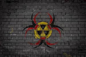 stilisiertes kombiniertes Zeichen der biologischen, chemischen und nuklearen Bedrohung foto