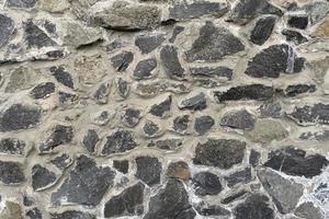 graue Steinstruktur, Mauerwerk aus Natursteinen foto
