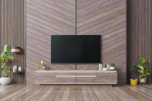 smart tv mockup hängt an der fischgrätenholzwand im modernen interieur. foto