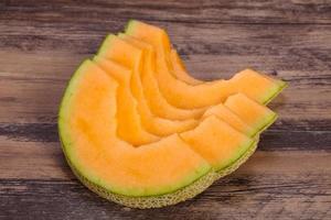 in Scheiben geschnittene leckere süße Melone in Scheiben geschnitten foto