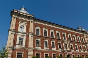 schöne fassade des alten stadthauses in krakau, polen foto