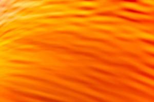 gelb-orangee Wellen mit Farbverlauf. Abstraktion foto