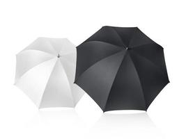 weißer und schwarzer Regenschirm lokalisiert auf weißem Hintergrund foto