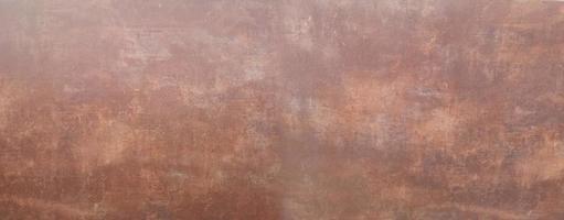 Kupferplattentextur Metallmuster Oberfläche Hintergrunddesign mit einer kreisförmigen Textur gealterte Plattentextur, altes abgenutztes Metall, braune Zementwand foto