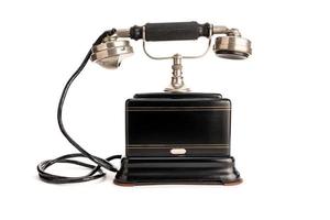 Antikes Telefon mit metallischem Hörer isoliert auf weißem Hintergrund. Vorlage, Mockup foto