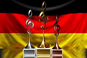 Violinschlüsselpreise für den Gewinn des Musikpreises vor dem Hintergrund der Nationalflagge Deutschlands, 3D-Darstellung. foto