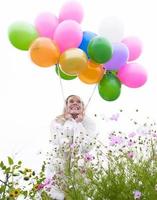 Frau mit Luftballons foto
