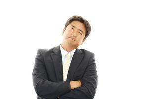 unzufriedener asiatischer Geschäftsmann foto