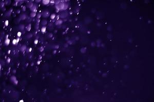 Bokeh lila Protonenhintergrund abstrakt foto