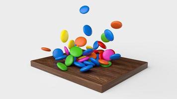 Regenbogenbeschichtete Bonbons, die auf Holzbrett 3D-Darstellung fallen foto