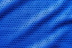 blauer stoff sportbekleidung fußball trikot mit air mesh textur hintergrund foto