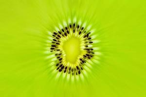 Frische Kiwi-Fruchtscheiben Nahaufnahme Makro Textur Hintergrund foto