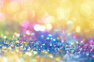 bokeh glitzer bunt verschwommener abstrakter hintergrund für geburtstag, jahrestag, hochzeit, silvester oder weihnachten foto