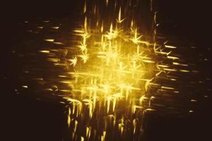goldene glitzernde bokeh-beleuchtungsbeschaffenheit verschwommener abstrakter hintergrund für geburtstag, jahrestag, hochzeit, silvester oder weihnachten foto