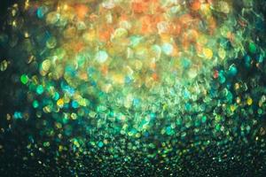 Bokeh-Effekt glitzert bunt verschwommen abstrakter Hintergrund für Geburtstag, Jubiläum, Hochzeit, Silvester oder Weihnachten foto