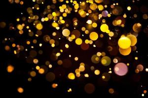 goldene glitzernde bokeh-beleuchtungsbeschaffenheit verschwommener abstrakter hintergrund für geburtstag, jahrestag, hochzeit, silvester oder weihnachten foto