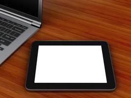 Arbeitsplatz mit digitalem Tablet und Laptop PC.