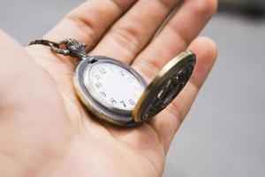 Fotoillustration der Taschenuhr ohne Stundenzeiger foto