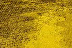 gelbe wand- oder papierstruktur, abstrakter zementoberflächenhintergrund, betonmuster, bemalter zement, ideengrafikdesign für webdesign oder banner foto