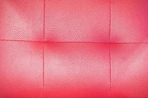 roter Sofabezug Schaum Textur Hintergrund foto