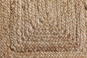 glatte Textur am Boden des Weidenstrohkorbs. extreme nahaufnahme einer vintage wicker textur. foto