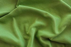 zerknitterter grüner Stoff Textur Hintergrund foto