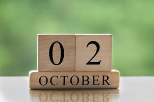 2. oktober kalenderdatumstext auf holzblöcken mit kopierraum für ideen. kopierraum und kalenderkonzept foto