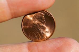 Münze in der Hand foto