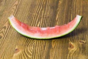 Beerenwassermelone essen foto