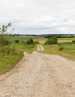 Sandig mit Schotterstraße foto