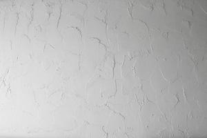 Weißzement Wand Muster Textur Hintergrund. foto
