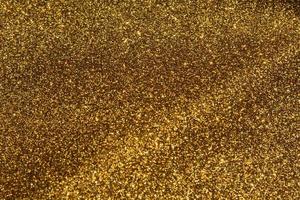 goldener Hintergrund mit verschwommenem Bokeh, goldener Glitzerhintergrund, abstrakte Bokeh-Lichter mit weichem hellem Hintergrund.