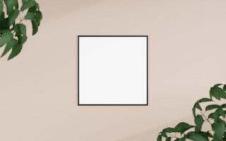 Saubere und minimalistische Vorderansicht, quadratisches schwarzes Foto- oder Posterrahmenmodell, das mit verschwommenen Pflanzen an der Wand hängt. 3D-Rendering. foto