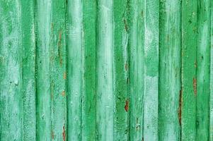 alter grün lackierter Holzzaunhintergrund foto