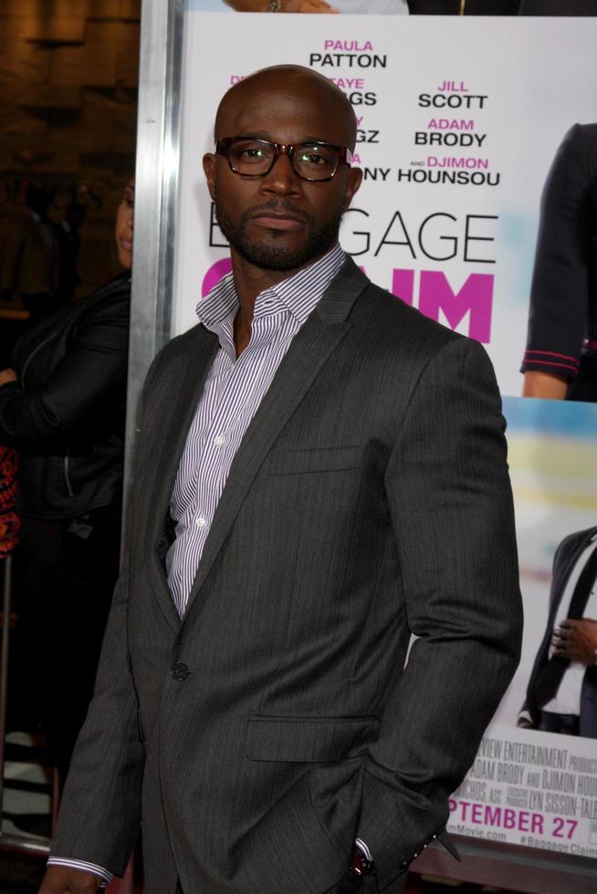 los angeles, 25 sep - taye diggs på baggage clain-premiären på regal 14 teatrar den 25 september 2013 i los angeles, ca. foto